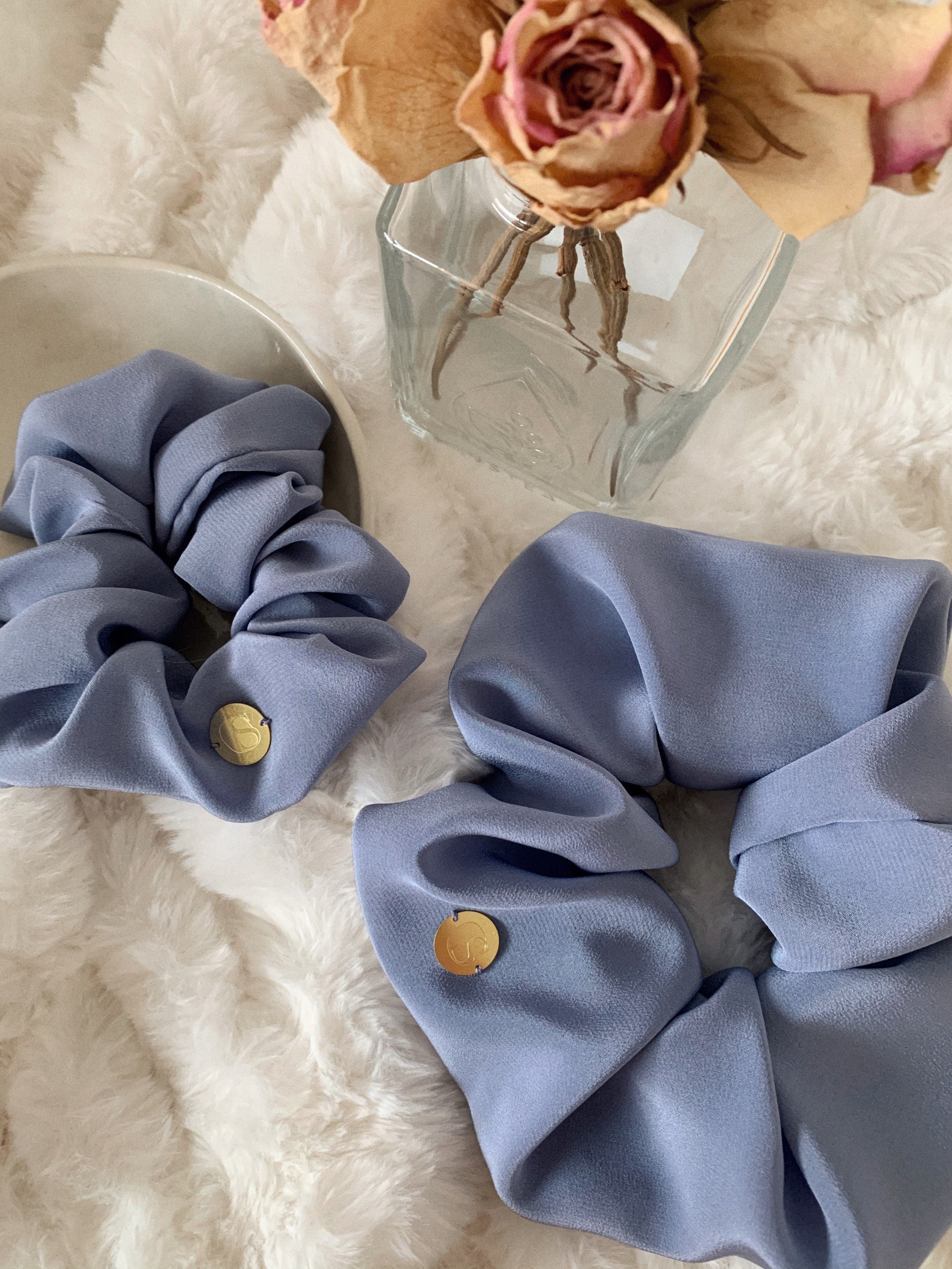 Lilac - flatlay of light purple scrunchie in the standard and jumbo size.